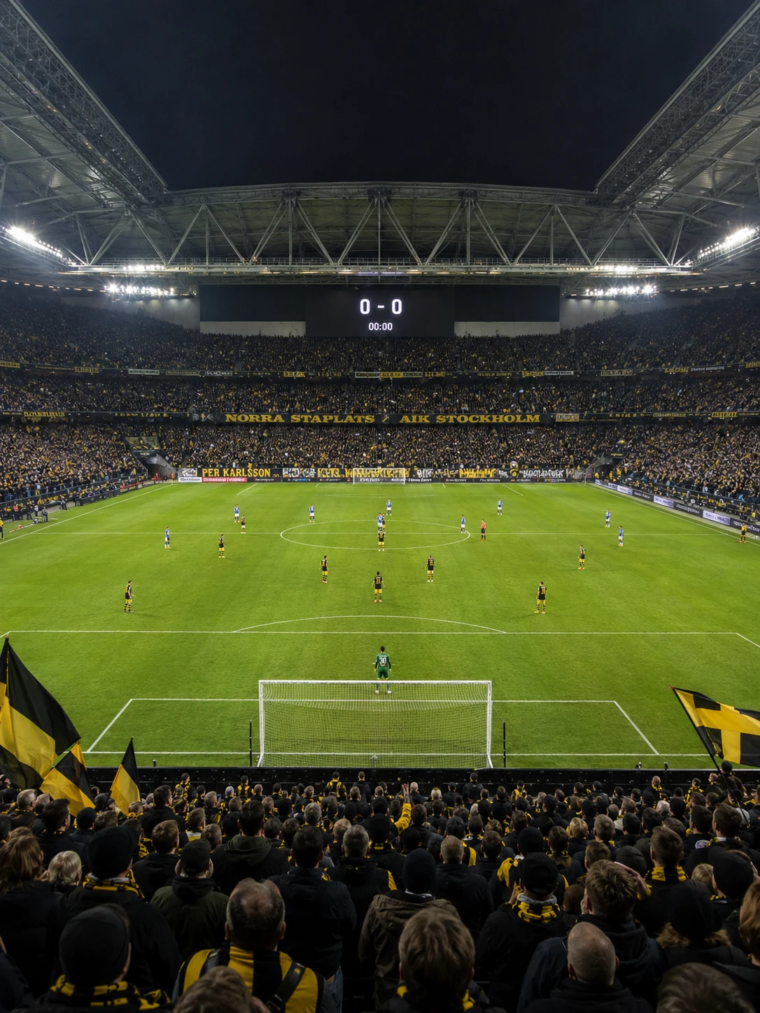 Fullsatt fotbollsarena med läktare och allsvensk match